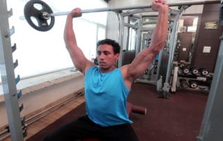 Seated Barbell Shoulder Press Exercise