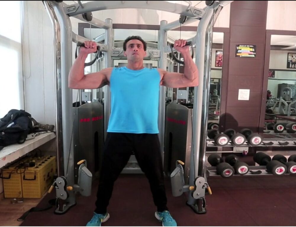 Dumbbell Standing Shoulder Press Exercise Guide Parambodyfitmind